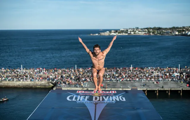 In this handout image provided by Red Bull, David Colturi of the USA dives from the 27 metre platform at Dun Laoghaire Harbour during the final competition day of the second stop of the Red Bull Cliff Diving World Series on May 12, 2019 at Dublin, Ireland. (Photo by Romina Amato/Red Bull via Getty Images)
