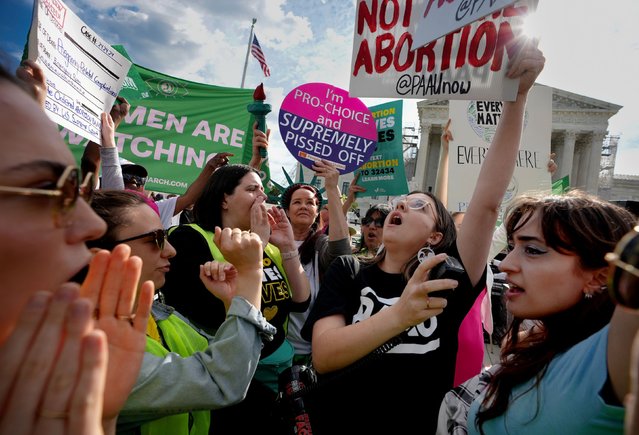 Abortion rights and anti-abortion supporters clash outside the Supreme Court on April 24, 2024 in Washington, DC. The Supreme Court hears oral arguments today on Moyle v. United States and Idaho v. United States to decide if Idaho emergency rooms can provide abortions to pregnant women during an emergency using a federal law known as the Emergency Medical Treatment and Labor Act to supersede a state law that criminalizes most abortions in Idaho. (Photo by Andrew Harnik/Getty Images)