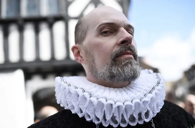 Greg Maupin wears a Tudor costume as he takes part in  celebrations to mark the 400th anniversary of the William Shakespeare's death in the city of his birth, Stratford-Upon-Avon, Britain, April 23, 2016. (Photo by Dylan Martinez/Reuters)