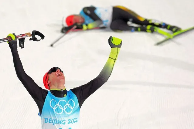 Gold medal finisher Germany's Vinzenz Geiger celebrates after the cross-country skiing portion of the individual Gundersen normal hill/10km event at the 2022 Winter Olympics, Wednesday, February 9, 2022, in Zhangjiakou, China. (Photo by Marko Djurica/Reuters)