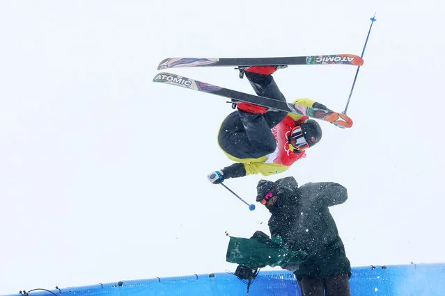 Jon Sallinen of Team Finland crashes into a cameraman during their first run of the Men's Freestyle Skiing Freeski Halfpipe Qualification on Day 13 of the Beijing 2022 Winter Olympics at Genting Snow Park on February 17, 2022 in Zhangjiakou, China. (Photo by Clive Rose/Getty Images)