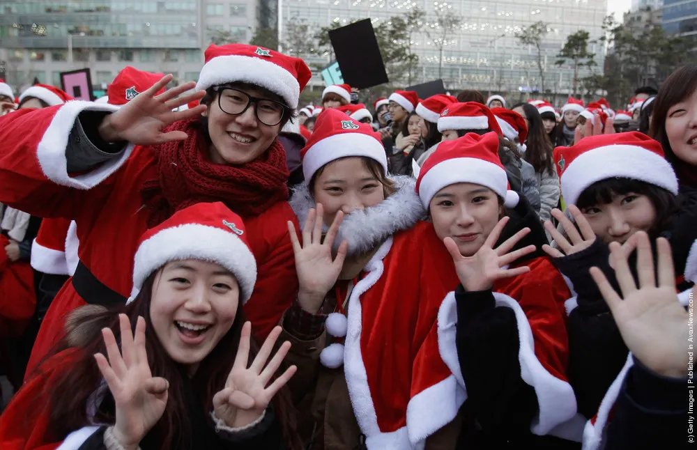 South Koreans Dressed As Santa Hit The Streets Of Seoul