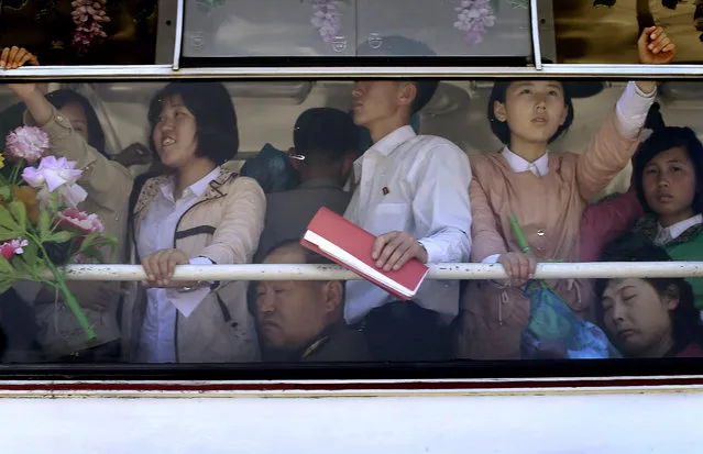 North Koreans, adults and youths, ride on an electric trolley bus Saturday, May 7, 2016 in Pyongyang, North Korea. (Photo by Wong Maye-E/AP Photo)