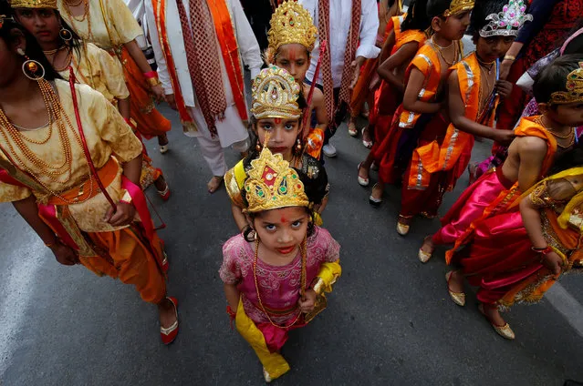Children dressed as Hindu god Rama and his wife Sita during a religious procession on the occasion of Ramnavmi festival in Jammu, April 5, 2017. (Photo by Mukesh Gupta/Reuters)