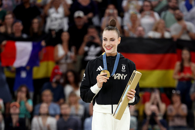 Gold medalist Darja Varfolomeev of Team Germany poses on the podium during the medal ceremony for the Rhythmic Gymnastics Individual All-Around Final on day fourteen of the Olympic Games Paris 2024 at Porte de La Chapelle Arena on August 09, 2024 in Paris, France. (Photo by Jamie Squire/Getty Images)