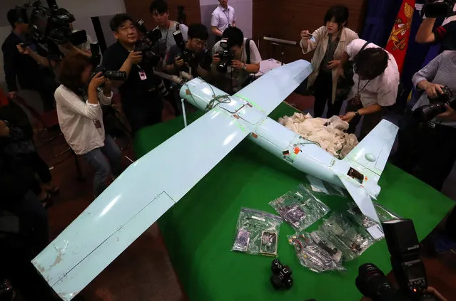 A small aircraft, which South Korea's Military says is a drone from North Korea, is seen at the Defense Ministry in Seoul, South Korea, June 21, 2017. (Photo by Lee Jung-hoon/Reuters/Yonhap)
