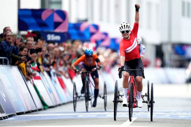 Emma Lund of Denmark reacts after winning the race in the women's T1-2 road cycling in Clichy-sous-Bois, France on September 7, 2024. (Photo by Maja Smiejkowska/Reuters)