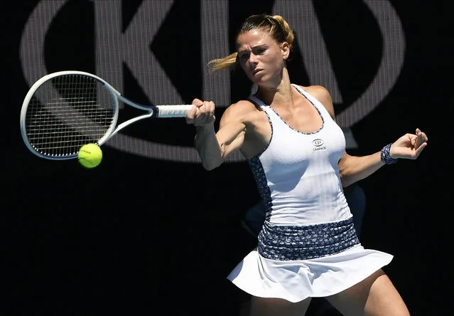 Italy's Camila Giorgi makes a forehand return to Germany's Angelique Kerber during their third round singles match at the Australian Open tennis championship in Melbourne, Australia, Saturday, January 25, 2020. (Photo by Andy Brownbill/AP Photo)