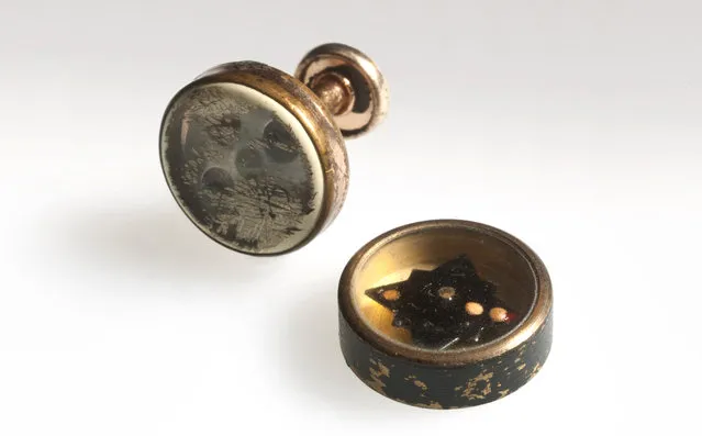 American servicemen going into harm’s way had a variety of ingenious places to hide small, even miniature, compasses for escape and evasion – in combs or razors, uniform buttons or, as seen here, in cufflinks. (Photo by Central Intelligence Agency)