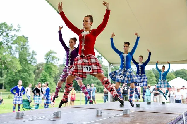 Highland dancers compete at Inveraray Highland Games on July 19, 2022 in Inveraray, Scotland. The games are held in the grounds of Inveraray Castle celebrate Scottish culture and heritage with field and track events, piping, highland dancing competitions and heavy events including the world championships for tossing the caber. (Photo by Jeff J. Mitchell/Getty Images)