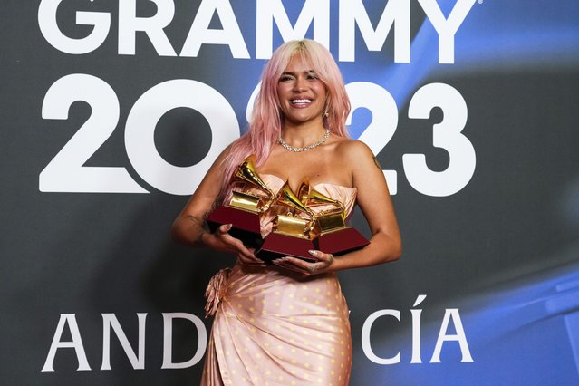 Colombian singer and songwriter Karol G poses with the awards for best urban album for “Mañana Sera Bonito”, for album of the year for “Mañana Sera Bonito” and the award for best urban fusion/performance for “TQG” during the 24th annual Latin Grammy Awards in Seville, Spain, Thursday, November 16, 2023. (Photo by Jose Breton/Invision/AP Photo)