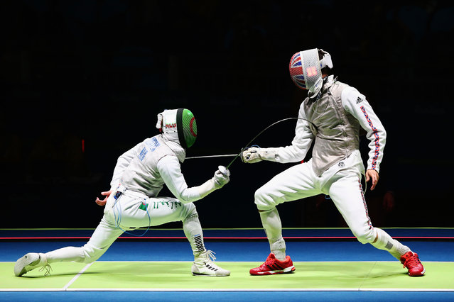 Richard Kruse (R) of Great Britain competes as he defeats Hamid Sintes (L) of Algeria during Men's Individual Foil qualification on Day 2 of the Rio 2016 Olympic Games at Carioca Arena 3 on August 7, 2016 in Rio de Janeiro, Brazil. (Photo by Alex Livesey/Getty Images)