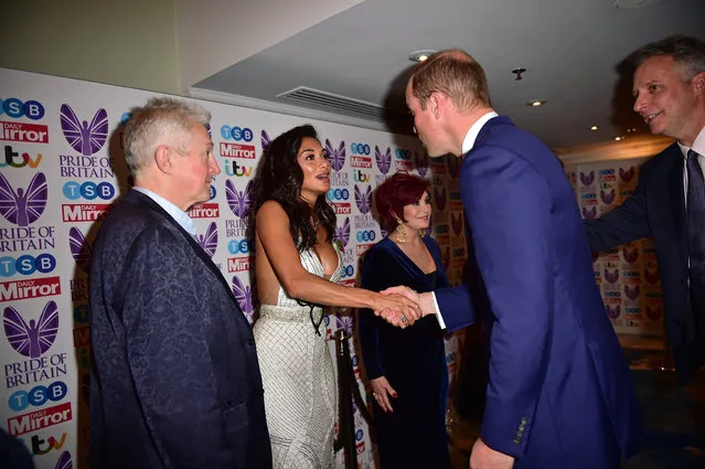 Prince William, Duke of Cambridge greets Nicole Scherzinger as he attends the Pride Of Britain Awards at the Grosvenor House on October 30, 2017 in London, England.  (Photo by Andy Stenning – WPA Pool/Getty Images)