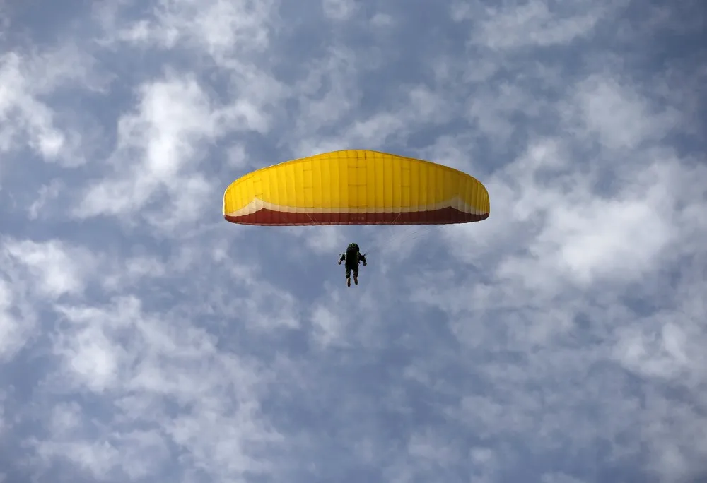 Afghan Paragliders Soar through Kabul's Skies