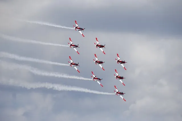 The Swiss Air Force PC-7 Team, flying Pilatus PC-7 Turbo Trainer aircrafts, take part in a display during the Malta International Airshow at Malta International Airport, outside Valletta, Malta, September 27, 2015. (Photo by Darrin Zammit Lupi/Reuters)