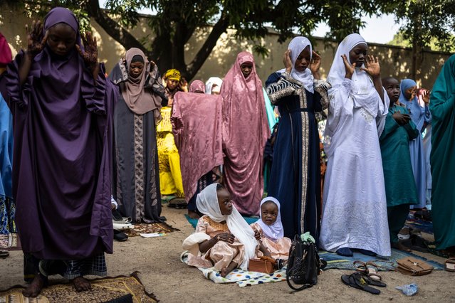 Muslims women pray at Kano Pillars Stadium in Nigeria during the Eid al-Fitr prayer on March 30, 2025. (Photo by Olympia de Maismont/AFP Photo)