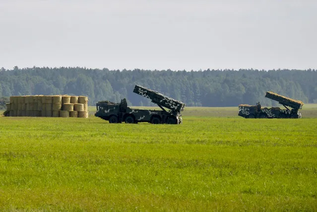 Belarusian Army rocket launchers are on a position during a military exercise near Grodno, Belarus, Saturday, August 22, 2020. On Saturday, Lukashenko renewed the allegation during a visit to a military exercise in the Grodno region, near the borders of Poland and Lithuania. (Photo by Andrei Stasevich/BelTA Pool Photo via AP Photo)