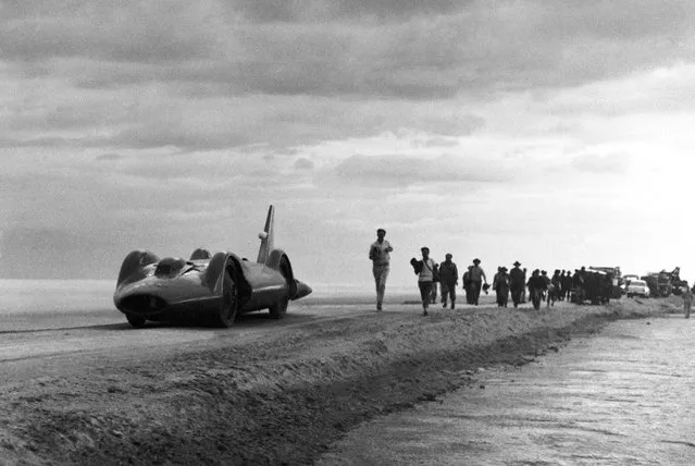 Bluebird, the 5,000 horsepower car in which Donald Campbell hopes to break the world land speed record, pictured during its first run, with Campbell at the controls, during preliminary tests on the specially prepared track at Lake Eyre, South Australia on May 2, 1963. Torrential rains flooded the lake, postponing his run until the following year, when he set a record of 403.10 mph (648.73 km/h). (Photo by AP Photo/HO)