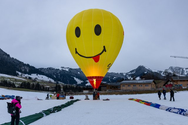A balloon takes part in the 45th International Hot Air Balloon Festival in Chateau-d'Oex, Switzerland, on January 30, 2025. (Photo by Denis Balibouse/Reuters)