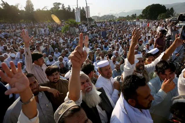 Thousands of government employees stage a sit-in protest in front of the parliament building demanding job regularization, increases in their salaries and other benefits, in Islamabad, Pakistan, Tuesday, October 6, 2020. (Photo by Anjum Naveed/AP Photo)