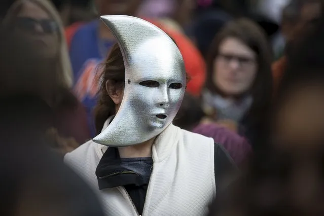 A person takes part in the Children's Halloween day parade at Washington Square Park in the Manhattan borough of New York October 31, 2015. (Photo by Carlo Allegri/Reuters)