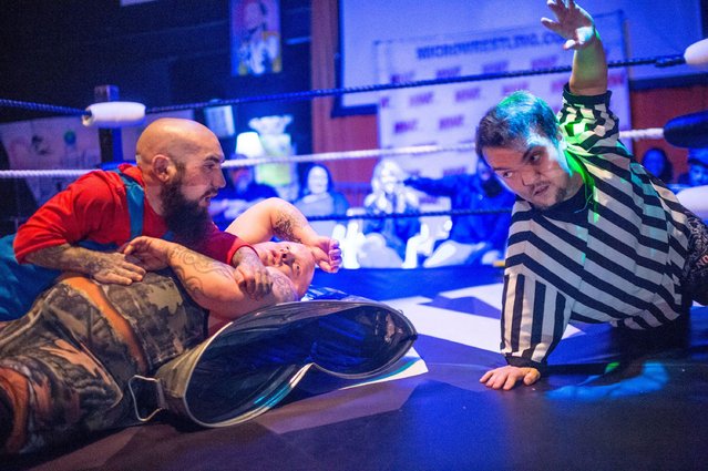 Flying Ryan, right, referees a match between Lil Mario and Lil Show Redneck Brawler at the Dollar Box in Hattiesburg, Ms., on February 8, 2018. (Photo by Emily Kask/AFP Photo)
