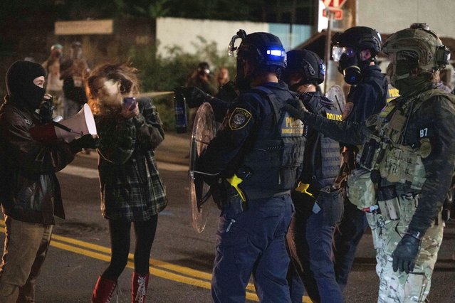 A protester is sprayed by a Department of Homeland Security officer outside a U.S. Immigration and Customs Enforcement facility on Thursday, October 2, 2025, in Portland, Ore. (Photo by Jenny Kane/AP Photo)