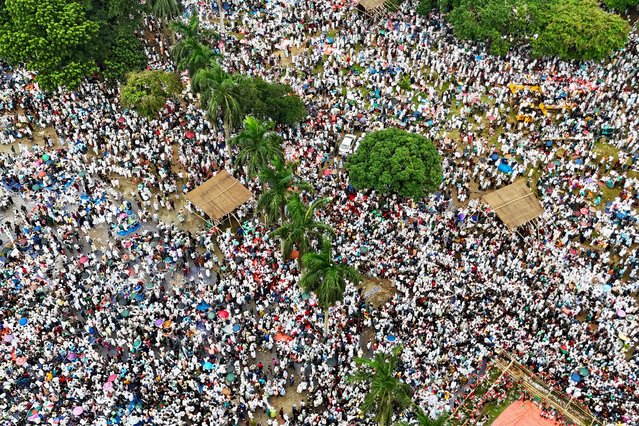 This aerial photograph shows Jamaat-e-Islami leaders and activists during a rally held to call for the introduction of a proportional representation system in the forthcoming general election amid other demands at Suhrawardy Udyan in Dhaka on July 19, 2025. (Photo by Munir Uz Zaman/AFP Photo)