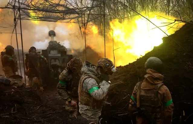Ukrainian artillery fires towards the frontline during heavy fighting amid Russia's attack on Ukraine, near Bakhmut, Ukraine on April 13, 2023. (Photo by Kai Pfaffenbach/Reuters)