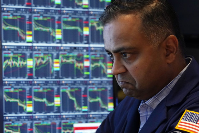 Specialist Dilip Patel works at his post on the floor of the New York Stock Exchange, Monday, August 5, 2024. (Photo by Richard Drew/AP Photo)