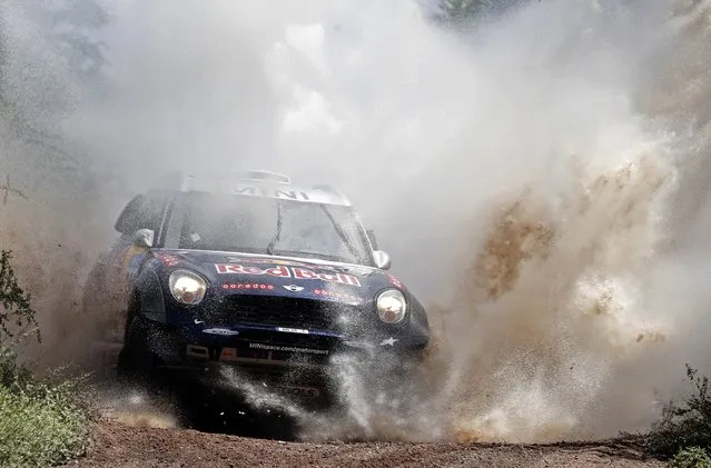 Mini driver Nasser Al-Attiyah of Qatar drives during the 12th stage of the Dakar Rally 2015 from Termas de Rio Hondo to Rosario January 16, 2015. (Photo by Jean-Paul Pelissier/Reuters)