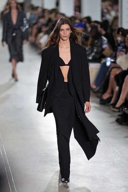A model walks the runway during the Michael Kors Fall/Winter 2025 fashion show as part of New York Fashion Week on Tuesday, February 11, 2025, at Terminal Warehouse in New York. (Photo by Charles Sykes/Invision/AP Photo)