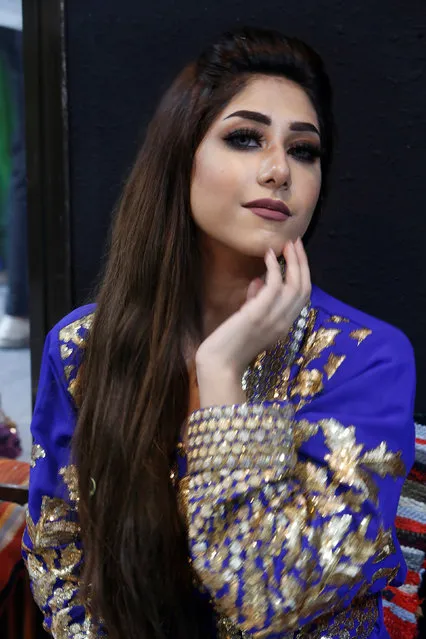 An Iraqi fashion model is seen during a photo session at a fashion centre in Basra, Iraq on July 2, 2018. (Photo by Essam al-Sudani/Reuters)