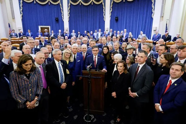 U.S. Representative Mike Johnson (R-LA) is surrounded by fellow members as he speaks to reporters after securing the nomination for House Speaker from the Republican conference on Capitol Hill in Washington, U.S. October 24, 2023. (Photo by Jonathan Ernst/Reuters)