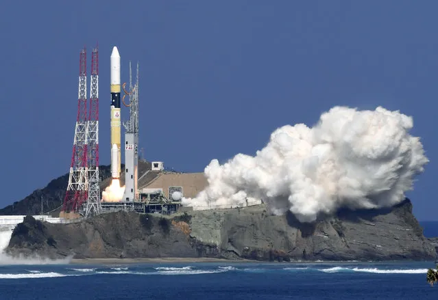Japan's rocket H-2A is launched, carrying aboard a green gas observing satellite “Ibuki-2”  and KhalifaSat, a UAE satellite, Tanegashima, southern Japan, Monday, October 29, 2018. The Japanese rocket carrying United Arab Emirates' first locally-made satellite has successfully lifted off from a space center in southern Japan. (Photo by Nozomi Endo/Kyodo News via AP Photo)