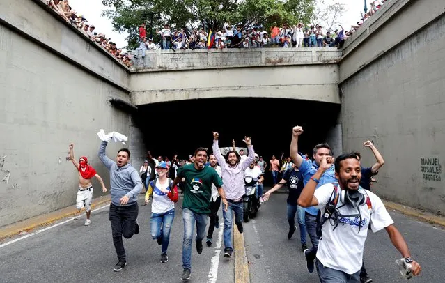 Opposition supporters take part in a rally against Venezuelan President Nicolas Maduro's government in Caracas, Venezuela on March 9, 2019. (Photo by Carlos Garcia Rawlins/Reuters)