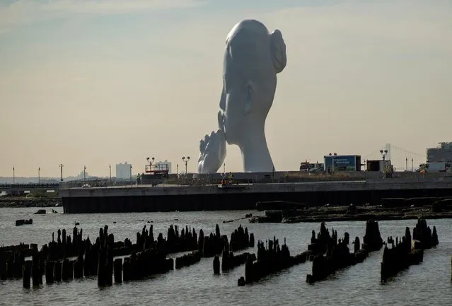 The statue “Water's Soul” by the artist Jaume Plensa is seen in Jersey City, New Jersey, U.S., October 14, 2021. (Photo by Eduardo Munoz/Reuters)