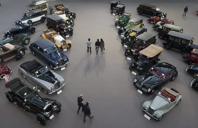 Classic cars and motorcycles are displayed during a press preview before a mass auction of vintage vehicles organised by Bonhams auction house as part of “Retromobile Week” at the Grand Palais in Paris, France, 05 February 2014. (Photo by Ian Langsdon/EPA)