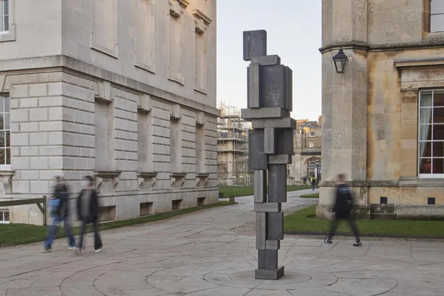 A new work by Sir Antony Gormley is unveiled at King’s College Cambridge in Cambridge, England on January 22, 2024. The sculpture, titled True, for Alan Turing, is made from rolled corten steel, the material used by the artist for his most well-known work, The Angel of the North. (Photo by Jo Underhill/Antony Gormley/The Guardian)