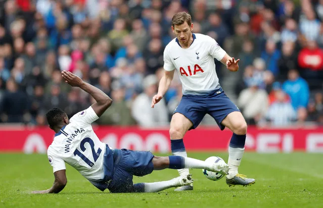 Tottenham's Victor Wanyama and Jan Vertonghen in actionr during the Premier League match between Tottenham Hotspur and Huddersfield Town at Tottenham Hotspur Stadium on April 13, 2019 in London, United Kingdom. (Photo by Matthew Childs/Action Images via Reuters)