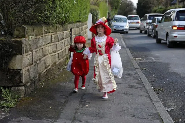 Jewish children dressed in costumes celebrate the annual holiday of Purim in Manchester, Britain on March 24, 2024. (Photo by Temilade Adelaja/Reuters)