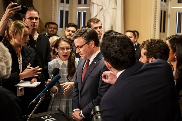 US House Speaker Mike Johnson talks to the press after the House passed a foreign aid bill in Washington, DC, on Saturday, April 20, 2024. The speaker's embrace of Ukraine aid represents a remarkable evolution for Johnson, who voted against funding for the country as a rank-and-file member and was facing an all-out revolt from his right flank. (Photo by Haiyun Jiang/The New York Times/Redux)