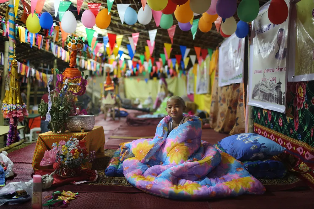 Young Thais Ordained into Buddhism