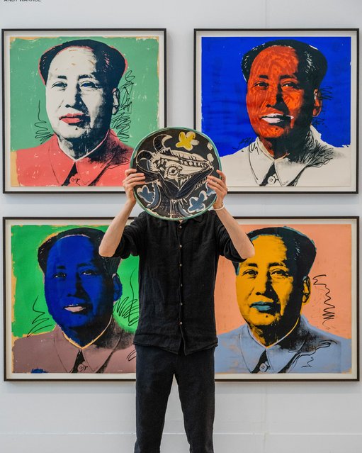 Pablo Picasso’s Tête de chèvre en profil, 1952, is shown in front of Andy Warhol’s Mao series, 1972, at a preview of auctions at Phillips in Mayfair, central London on June 4, 2024. (Photo by Guy Bell/Rex Features/Shutterstock)