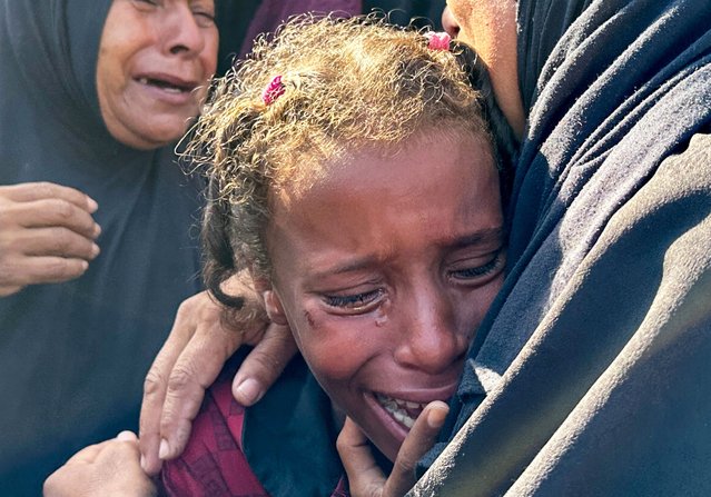 A mourner reacts during the funeral of Palestinians killed in Israeli strikes, amid the Israel-Hamas conflict, in Deir Al-Balah, in central Gaza Strip on June 7, 2024. (Photo by Doaa Rouqa/Reuters)