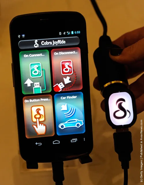 The Cobra JoyRide car charger by Cobra Electronics is displayed during a press event at The Venetian for the 2012 International Consumer Electronics Show
