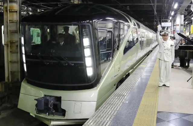 The new Train Suite Shiki- Shima luxury sleeper train departs the Ueno Station, Tokyo on May 1, 2017. The train will run bound for Hokkaido, the Tohoku and Koshinetsu regions. JR East plans to offer services similar to luxurious hotels to improve the image of area along the railroad and attract tourists. Tickets for trips departing from this May to March 2018 have already sold out. (Photo by The Yomiuri Shimbun via AP Images)