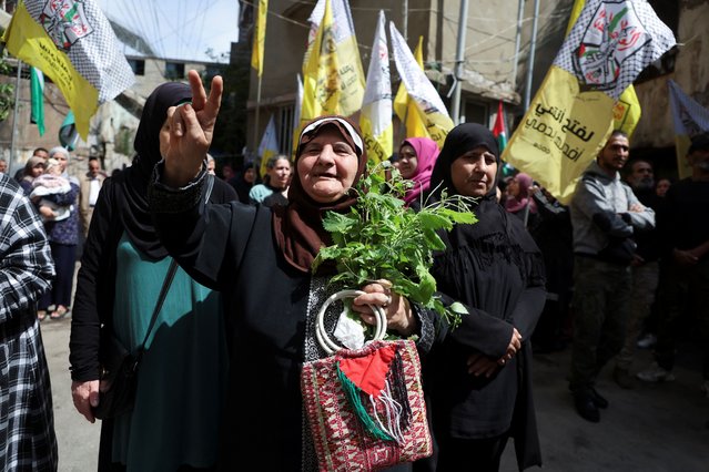 A Palestinian woman gestures during a march marking the annual al-Quds Day, (Jerusalem Day), at Burj al-Barajneh Palestinian refugee camp in Beirut, Lebanon on April 5, 2024. (Photo by Mohamed Azakir/Reuters)