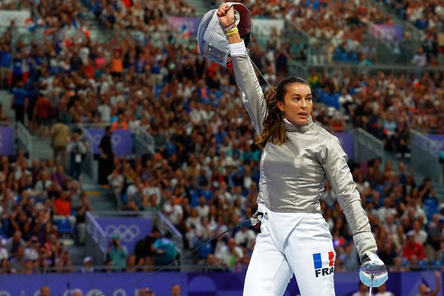 Sara Balzer of France competes with Olga Kharlan of Ukraine in the women's foil individual during the Paris Olympic Games 2024 on day 3 at Grand Palais on July 29, 2024 in Paris, France. (Photo by Albert Gea/Reuters)