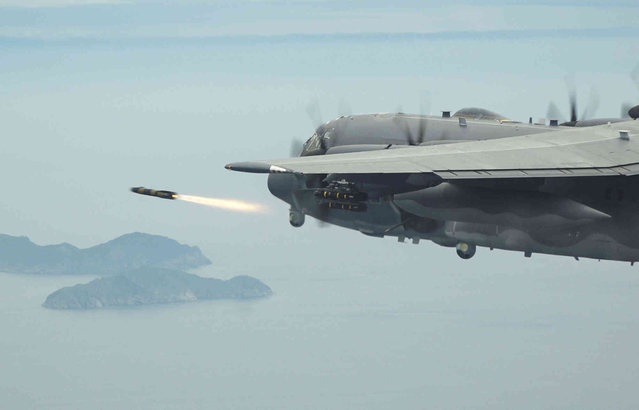 In this photo provided by South Korea Defense Ministry, a U.S. AC-130J Ghostrider fires an AGM-114 Hellfire missile during the joint aerial drills between South Korea and the United States, over the Korean peninsula in South Korea, Thursday, June 20, 2024. (Photo by South Korea Defense Ministry via AP Photo)